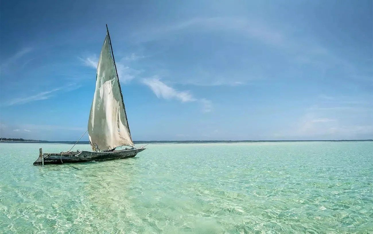 Traditional wooden dhow sailing from Watamu to Sudi Island Kenya